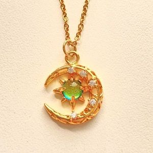 Bundle 3 for $45. Gold star and moon necklace.